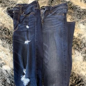 2 pairs of skinny ripped jeans